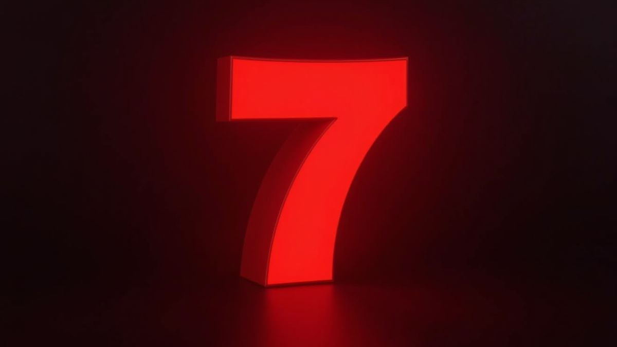 Número 7 brillante en un entorno de casino oscuro.