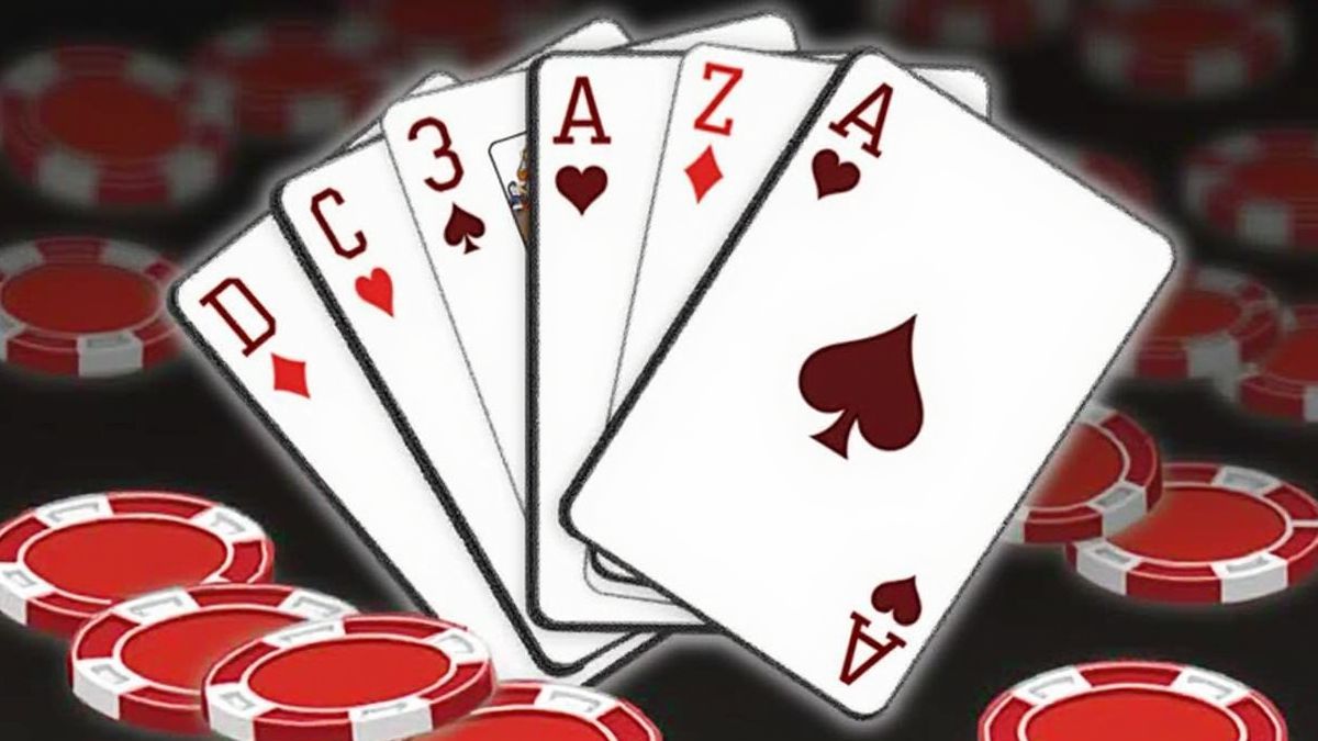 Baraja de cartas com ases e doses destacados em um ambiente de cassino.