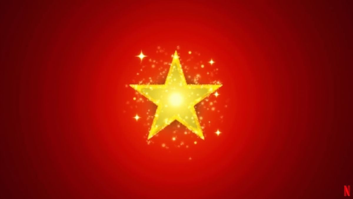 Ein leuchtender goldener Stern umgeben von Glitzern, vor einem roten Hintergrund.