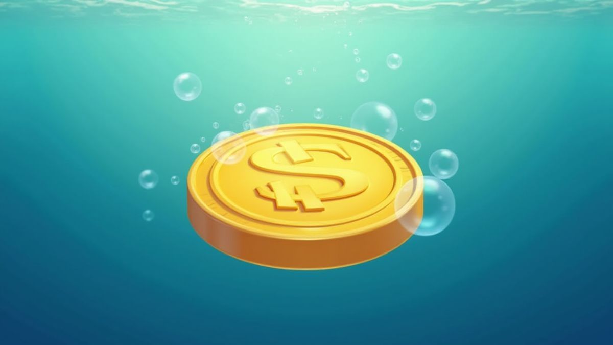 Moneda dorada flotando bajo el agua rodeada de burbujas.