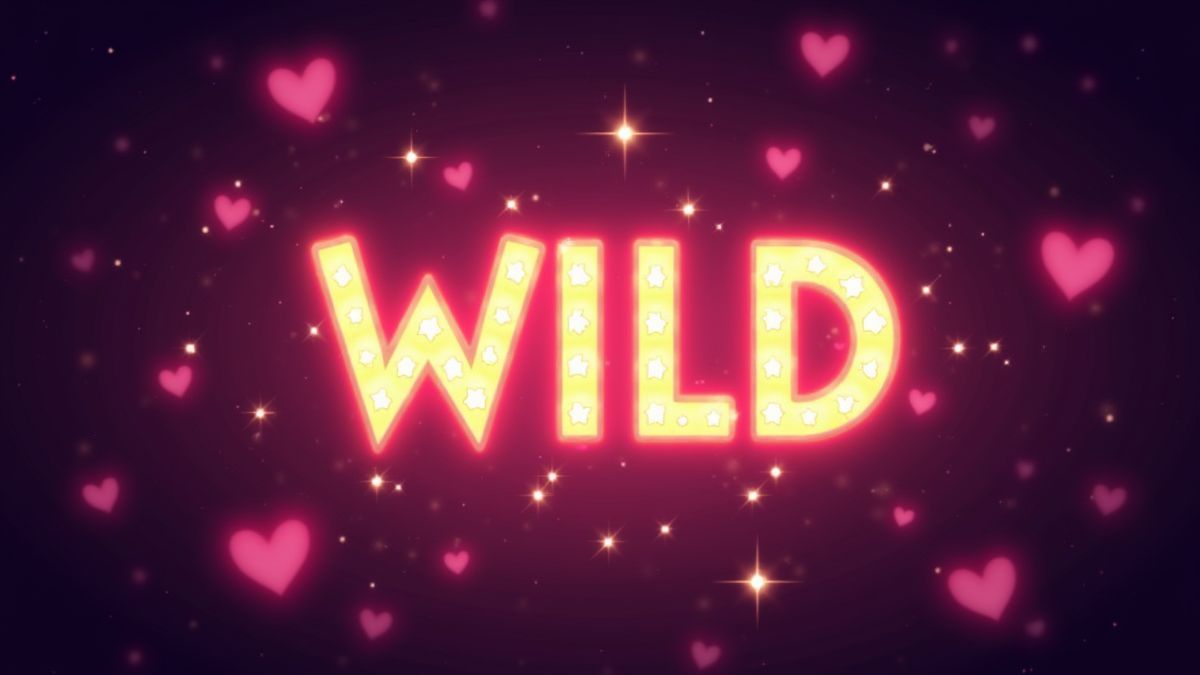 Symbole Wild brillant entouré de paillettes et de cœurs.