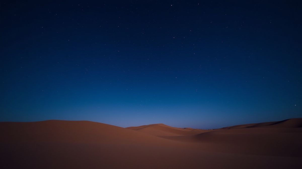 Cielo nocturno árabe con estrellas brillando sobre las dunas del desierto.